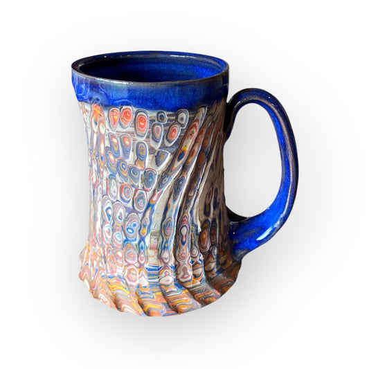 Handcrafted Agateware Stoneware Travel Mug: Fluted Pottery Coffee Cup with Blue Accents