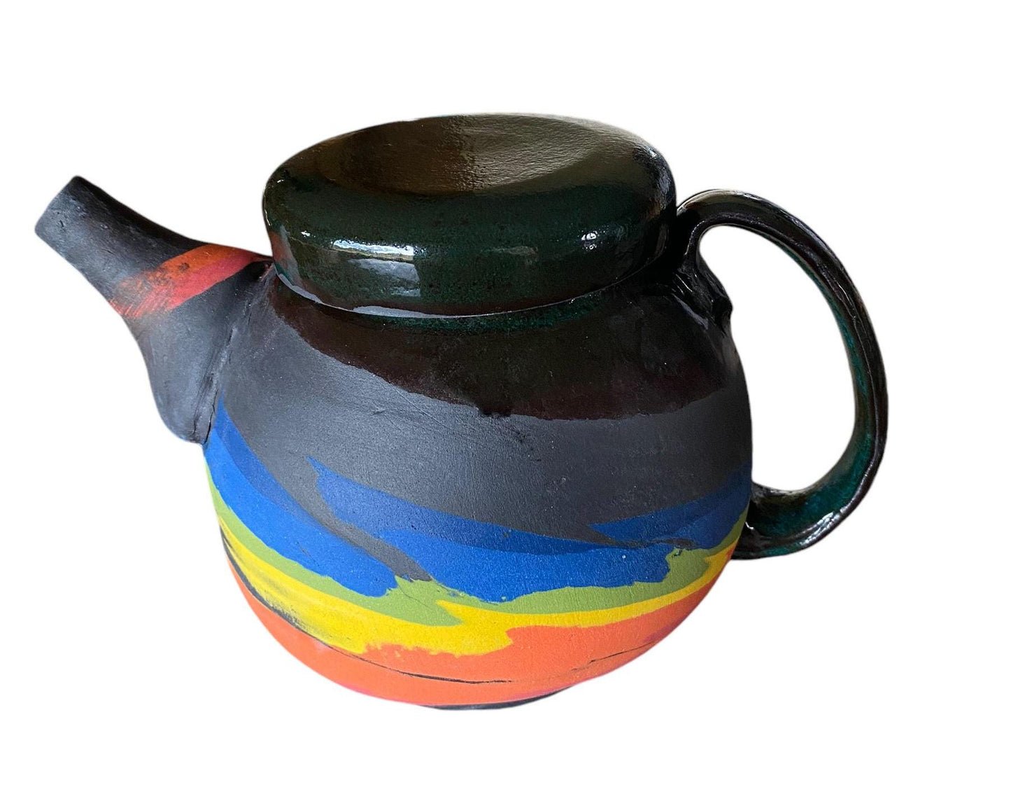 A 2-cup teapot made from black clay, featuring intricate inlays of layered colored clay.