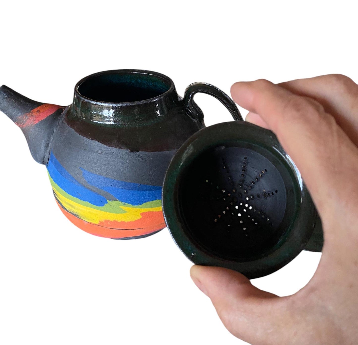 A 2-cup teapot made from black clay, featuring intricate inlays of layered colored clay.