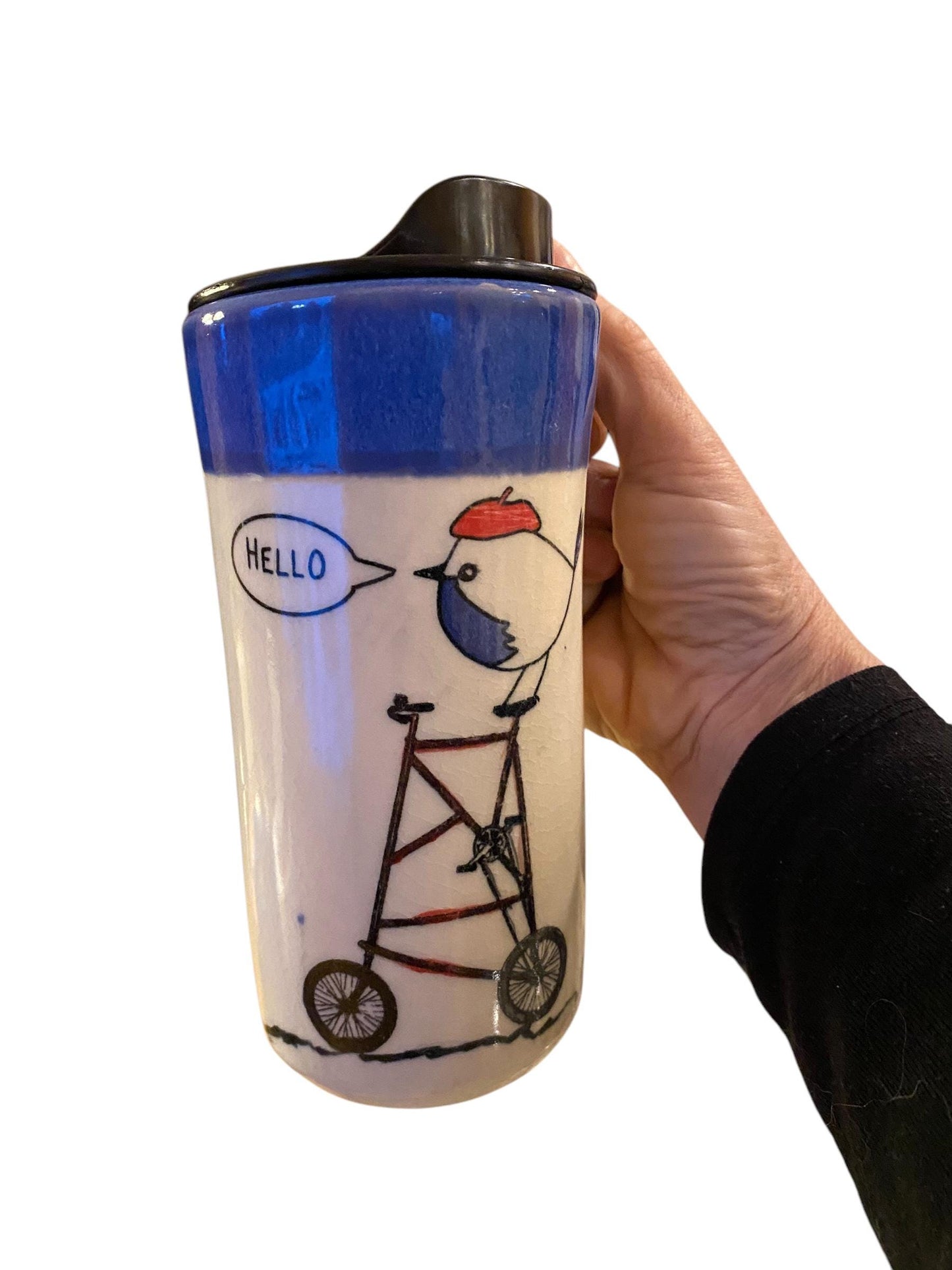 Reactive Blue Glaze 16 -Ounce Travel Mug With Locking Lid Embellished with A Bird Riding a Bike With  - Unique Pottery Mug