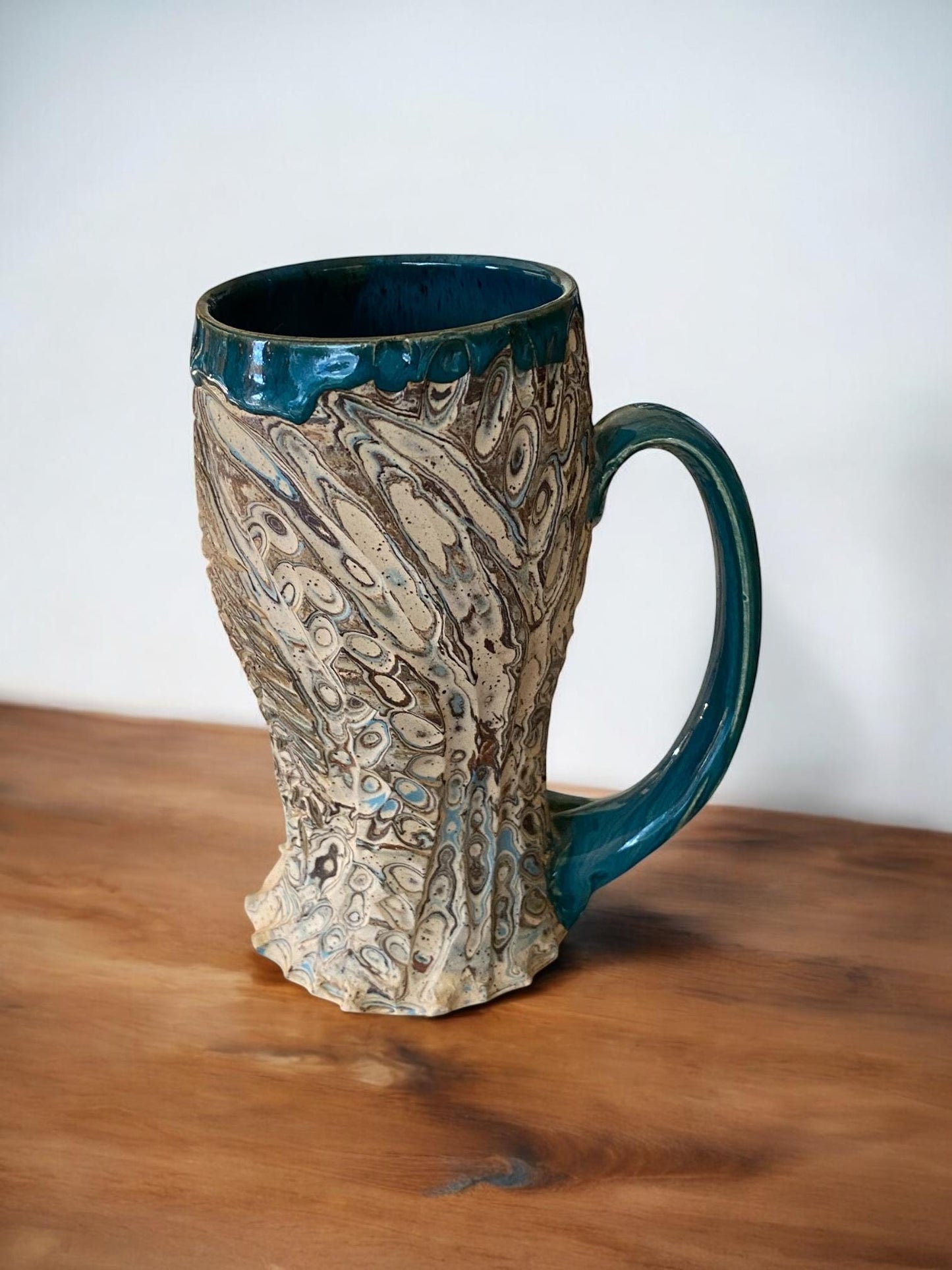 Artisanal Fluted Porcelain Mug: Neriage Swirled Clays, Hand-Carved Satin-Smooth Unglazed Pottery