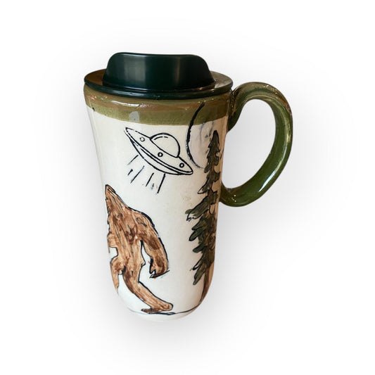 Hand-Painted Bigfoot and UFO Stoneware Travel Mug: Unique Ceramic Sasquatch Cup for Outdoor Enthusiasts