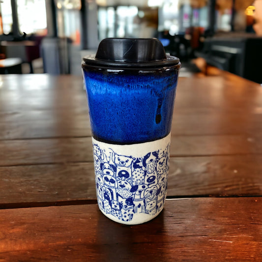 Handmade 16-Ounce Travel Mug Embellished with Playful Dogs - Stylish Pottery Mug for Your Coffee Adventures. Includes Locking Lid.